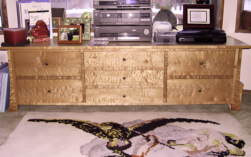 Custom credenza for stereo and storage with curly maple